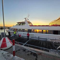 Boat from Ship to Venuce