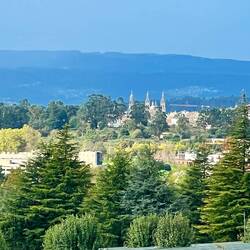 First glimpse of the Santiago Cathedral spires from Monte de Gozo, or Mt. Joy.