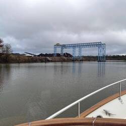 River scene - woodchip loader