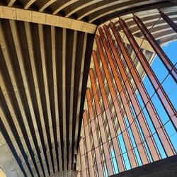 Sydney Opera House's shells are made of separate concrete segments tensioned together by steel cable