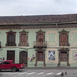 Old Datsuns and adobe buildings. Fresh food and friendly people. Genuine Ecuador.