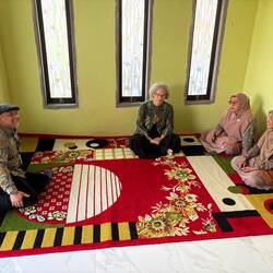 Peace Corps Volunteer at home