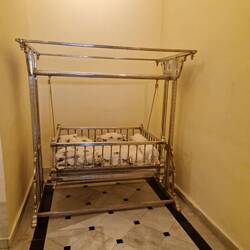 A silver cot