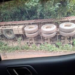 Chinese lorry heavily laden tipped over