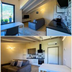 Open space living/kitchenette area at the apartment — Verbania, Italy.