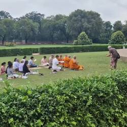 Buddhists praying at the archeology site