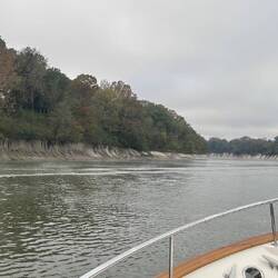 The white chalk riverbank is apparent as we overtake "Slow Poke"