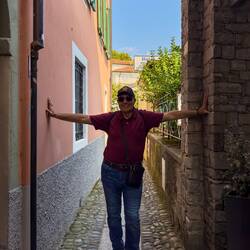 Mui showing how narrow some of the streets are ... Isola dei Pescatori ... Borromean Islands.