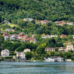 Mainland lakefront town from Isola dei Pescatori ... Borromean Islands — Stresa, Italy.