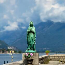 Statue of the Virgin Mary at the small boat harbor ... Isola dei Pescatori ... Borromean Islands.