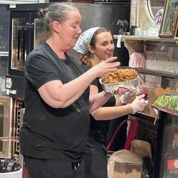 Mary (on the left) makes EVERY scone and loaf by hand!