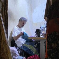 Tailor still working late at night