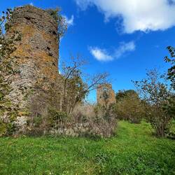 Towers of Orlando. Left an Etruscan tower that had memorials, right a ruined 12th C belltower