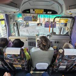 Fold down aisle seat on bus