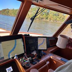 All in a day's work for the captain. He stays cool with a hot coffee...