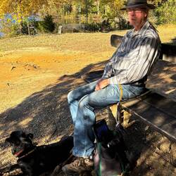 Les and Indy relaxing by the lake