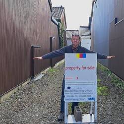 'Narrow' is apparently a common width here. Vacant land for sale here bet'n 2 bldgs.