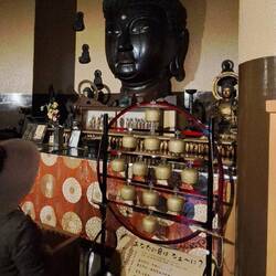 This Buddha head has survived numerous fires.