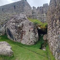 This enormous rock serves as foundation for the building above