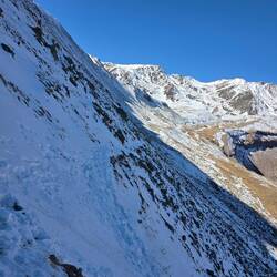 The slippery snow patch. Dan slid from the upper footpath to the lower before stopping on some rocks