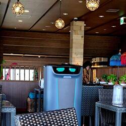 Automated robot that delivers food (shelves on reverse side).