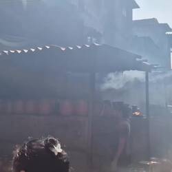 The pottery being hardened..the fuel is rags from the clothes making industry