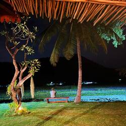 Man sits in the evening.