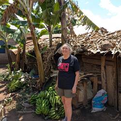 After a banana beer tasting, Connie models Broadbands tshirt in Tanzania.