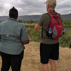Our guide and Chris in the rice field