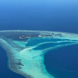 An atoll ... as we fly along.