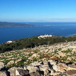 The monastery in the distance, then the mainland... Athens, we think