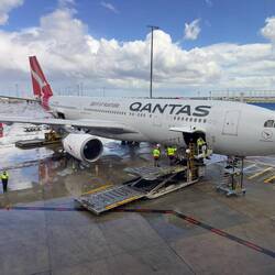 VH-EBP at the gate in MEL waiting to operate QF105.