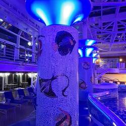 The 'fishy' pool area is nicely lit at night.