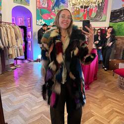 Being unemployed is not commensurate with her taste in vintage coats