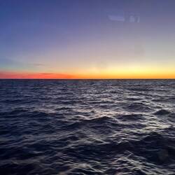 Just another sunset. Pilothouse and instrument lighting is turned down