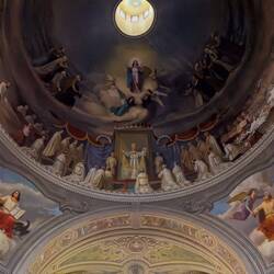 The dome fresco features the Assumption of Mary into Heaven with Pope Pius XII — Cannero Riviera.