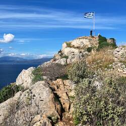 Flagpole overlooking harbour