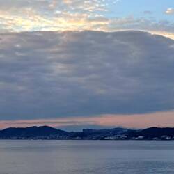 Last view of Mt Fuji bashfully hiding behind some clouds.