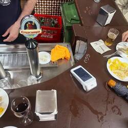 The price of the tapas is written on the countertop