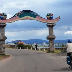 Villages often have an entry arch. Of course this one has pompoms