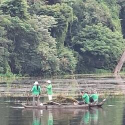 Locals clearing weed from moat.....endless task