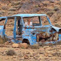 Elfi doing her best using all "diff-locks" and reduction to get this stuck car out of its dilemma