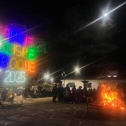 Full moon and bonfire beside the church