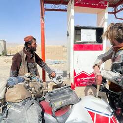 At a fuel station. The pump needs to be started manually here