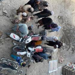 Lubing the chain under audit.