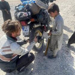 Next to the fuel station, there's a small workshop run by a nine year old.