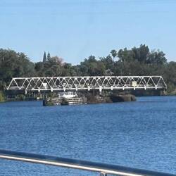 The Moore Haven railroad swing-bridge opens for us (and a westbound vessel)