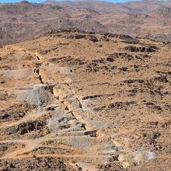 Marocco is a mining country. Here a 3m wide band had been cut out of the landscape for km and km