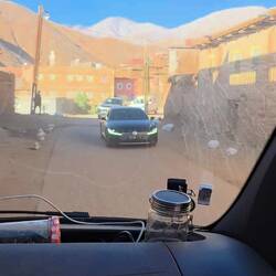 An endless motorcade followed by ambulance and tank vehicle