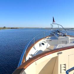 Heading out from Clewiston through a shallow channel, with the lake up ahead